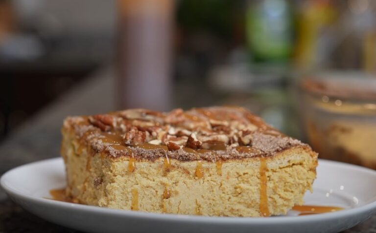 A slice of caramel-drizzled, pecan-studded cake