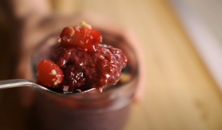 A spoonful of vibrant berry bliss, bursting with fresh strawberries and raspberries